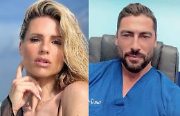 Michelle Hunziker, bacio in mascherina con il medico più bello d'Italia